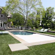 This project, by Covertech LLC in Southampton, N.Y., illustrates an automatic pool cover in action.