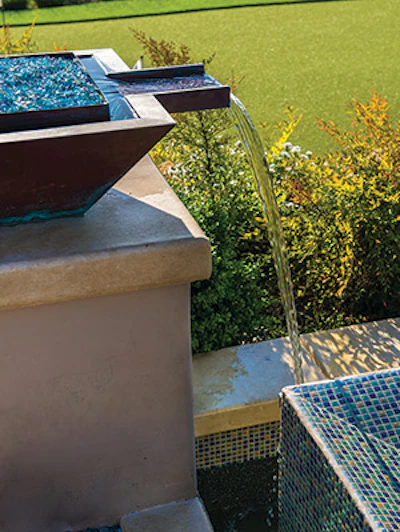 Vanishing edges and sheeting waterfalls may not be favorable in terms of minimizing evaporative loss. But for these clients, rather than forgoing luxury they've simply decided to avoid using those features during times of drought. - Click to enlarge