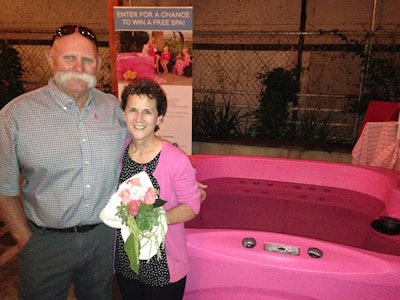 Breast cancer survivor Traci Andrews was the lucky winner of a special-edition pink hot tub.