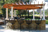 Studies show millennials are hungry for backyards like these, with defined decks and/or pavement and shade structures. (Photos courtesy of HB&G Building Products.)