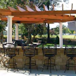 Studies show millennials are hungry for backyards like these, with defined decks and/or pavement and shade structures. (Photos courtesy of HB&G Building Products.)