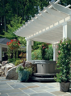 Another reason customers are excited about pergolas: they're a great way to show off a hot tub.