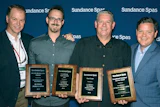 From left to right: Kevin Sheffer, Sundance Spas regional manager; Austin Buckingham, Outback’s digital marketing manager; Paul Buckingham, owner of Outback Pools & Spas; and Drew Meng, president of North American spa business, Jacuzzi Worldwide. Photo taken after Outback won four awards for stellar sales performance in 2015.