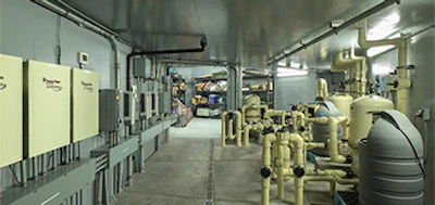 The equipment room, which was originally plumbed for a programmable moving water display on the water walls, was left with just a uniform flow.