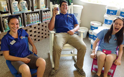 A few seasonal employees at Fox Pools and Spas share a laugh.