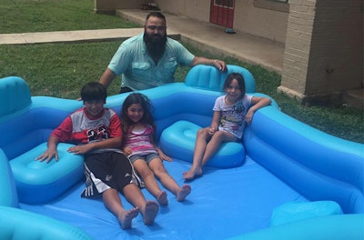 Todd Arredondo and a few happy, new pool owners. (Photo via Facebook)