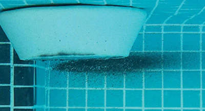 The sacrificial anodes we used immediately started precipitating black metal dust which, although unsightly, proved the cathodic protection we specified was working.