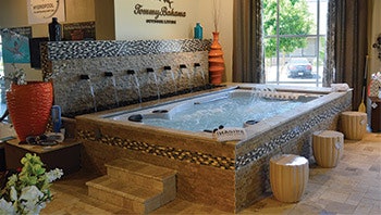 A Hydropool display highlights a unique tile treatment and accessories.