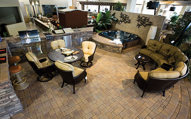 The showroom at Imagine Backyard Living illustrates the many ways portable spas and outdoor furniture can intertwine.