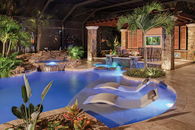 Category: Concrete, Freeform (600 sq. ft. or less) By: Ryan Hughes Design, Palm Harbor, Fla.Decking/Coping: Harmony Stone