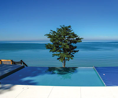 Automatic pool covers are making great strides in recent years with stainless steel cables, corrosion-resistant parts and automation features.