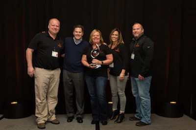 From left: Tom Junck, Watkins Wellness President Steve Hammock, Jacque Stauffer, Liz Sheppard, and Jeff Carlson