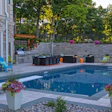 The award-winning project replaced the old pool and added a retaining wall.