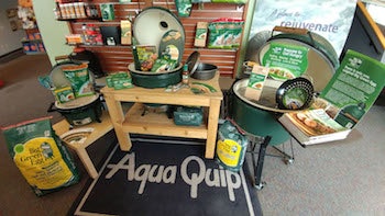 A charcoal grill display at Aqua Quip