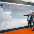 Showing off a spa to interested buyers.