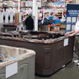 Spa Express employee Michael Ketchum is ready for a day of sales at Costco.