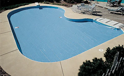 Some winter covers don't use anchors at all, such as this cover from Fox Pools that relies on beads and tracks to hold the cover in place.
