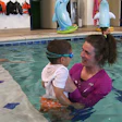 Angels of America's Fallen, one of the recipients of the Step Into Swim campaign grants, gives a swim lesson.