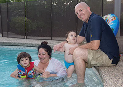 The Sigals enjoy their fully restored backyard.