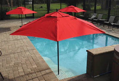 Umbrellas mounted in lounging shelves or beach entries have become a popular feature with many pool owners. Shading shallow waters is the primary focus of Fiberlite Umbrellas, which designs its fiberglass-framed umbrellas specifically for pool and spa use.