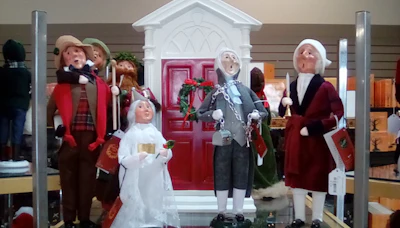 Byer's Choice Carolers accompany the Christmas music on the store speakers.