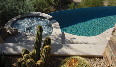 Juxtaposing luxurious aquatic spaces with arid landscapes affords designers powerful opportunities to create drama, comfort and luxury on the cusp of desolation. (Photo courtesy of Kevin Woodhurst)