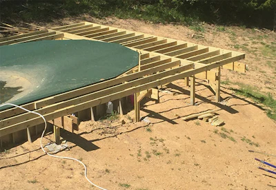 The semi-inground model addresses the aesthetic issues homeowners may have with traditional aboveground pools. Sinking the pool into the ground and adding decking can help the pool better integrate into the backyard. Project by Dig-M-Installers, Inc.
