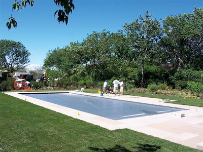 By opting for an auto pool cover instead of winterizing, the owner of this pool saw savings of 20 percent.
