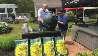 Ocean Spray Owner Joe Musnicki works the Big Green Egg for hungry guests.