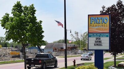 Patio Pleasures store sign, taken in May