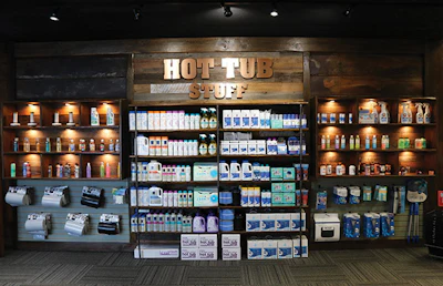 Isaac's store features boutique-style shelving with LED lighting that creates the perfect spotlight for hot tub accessories. While the shelves aren't packed with product (and therefore need to be restocked more frequently), fewer items on the shelf helps elevate the perceived value of the items.