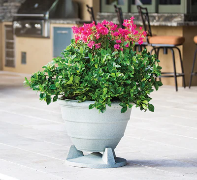 Outdoor speakers can also be dual-purpose, like this speaker that doubles as a planter.
