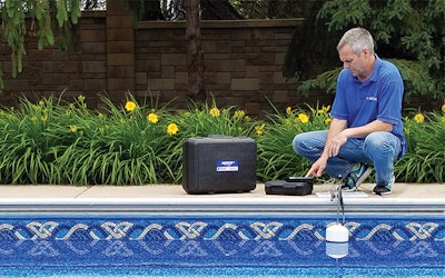 Lance Anderson demonstrates his company’s rapid water loss sensing system, a new tool that can dramatically expedite the leak detection process.