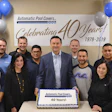Automatic Pool Cover's celebration was held at its newly expanded manufacturing facility, complete with a big anniversary cake.