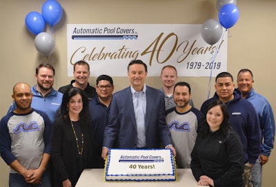 Automatic Pool Cover's celebration was held at its newly expanded manufacturing facility, complete with a big anniversary cake.