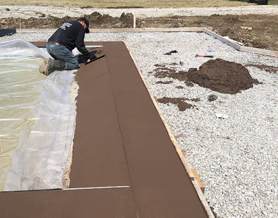 'The installation of this beach-entry pool was really quite simple. It wasn't much different from installing one of the large fiberglass pools with a tanning ledge. Basically, you just need to keep the same angle of the pool all the way into to deck where the pool and deck meet.'— Jonathan Hendrick