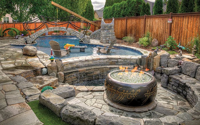 As its name suggests, The Hobbit Pool includes a number of details inspired by the classic book. The 'fire ring of power' (far left) is nested at the heart of the landscape, just as the ring in 'The Hobbit.'