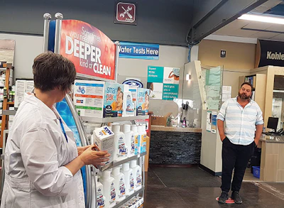 The social distance marker on this showroom floor keeps customers 6 feet away from staff.