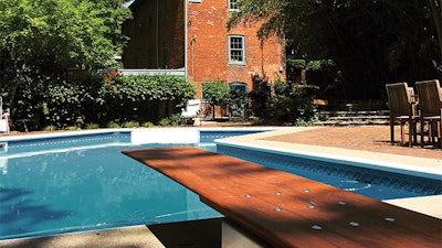 A beautiful diving board can act as an artistic accessory to the home, as well as a fun accessory to the pool. (Photo courtesy Wooden Diving Board Company)