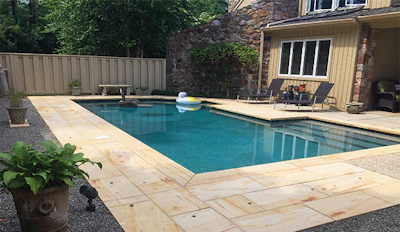 This pool is now a backyard focal point. Where previously the client had trouble walking around the pool itself, builder Kevin Barry made sure to create plenty of space for the homeowner to enjoy. (Photo courtesy Kevin Barry)