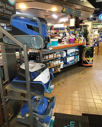 The APC display at SwimFun Pool & Patio in Olathe, Kan., located right next to the water test station. All the retailers in this story agreed that prominent display is a key to maximizing sales of automatic pool cleaners.