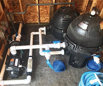 Tidy variable-speed pump, filter and heater layout from Aqua-Tech in Winnipeg, Canada. (Photo courtesy Aquatech)