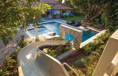 This backyard haven, built by The Green Scene, helps to make life fun despite the restrictions of COVID. (Image courtesy of GreenSceneLandscape.com by Irvin Pacheco)