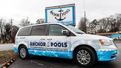 The delivery number, separate from the company's, is listed on Anchor Pools' fleet of vehicles.