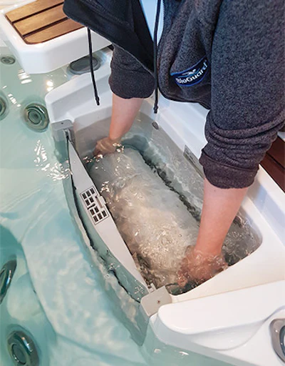 Spa cartridge filter removal at Aqua Tech Pool & Bath, step one in the cleaning process. (Photo courtesy Aqua Tech Pool & Bath)