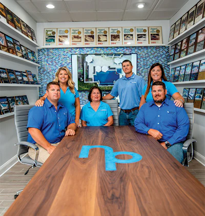 National Pools is now on its third-generation, led by Jason, Lee and Austin Vaughan along with spouses Ginne and Mea, pictured here with Founder Gloria 'Winky' Vaughan.
