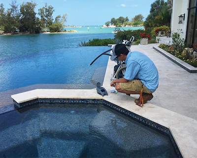 Tim Tarricone, Aquatic Pool Systems, spins up a result on his LaMotte WaterLink SpinTouch at a residential pool near Tampa, Fla. (Photo courtesy Aquatic Pool Systems)