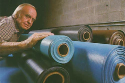 Joe Lamb, inventor of the automatic pool cover, inspects raw materials before production. (Photo courtesy Cover-Pools)
