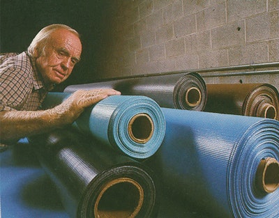 Joe Lamb, inventor of the automatic pool cover, inspects raw materials before production. (Photo courtesy Cover-Pools)