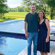 Pat and Sarah Barrett stand in front of their automatic pool cover that saved the life of a woman who safely drove over it after losing control of her car. (Photos courtesy Brad Lovins)